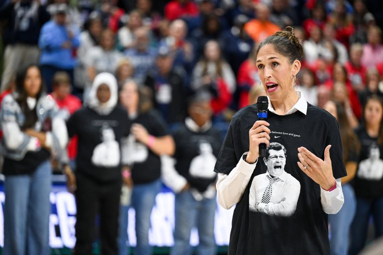 Connecticut Huskies wmones basketball alumni Rebecca Lobos speaks after a game between the Huskies and the Fairleigh Dickinson Knights to celebrate the all time NCAA wins record set by head coach Geno Auriemma at Harry A. Gampel Pavilion.