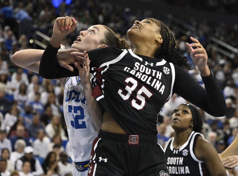South Carolina Gamecocks center Sakima Walker (35) and UCLA Bruins forward Angela Dugalic (32) jockey for rebounding position during the fourth quarter at Pauley Pavilion presented by Wescom.