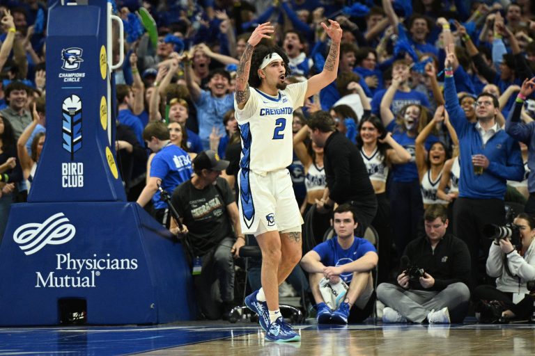 Creighton Bluejays guard Pop Isaacs (2) reacts to the crowd after making a three point basket against the Kansas Jayhawks during the second half at CHI Health Center Omaha.