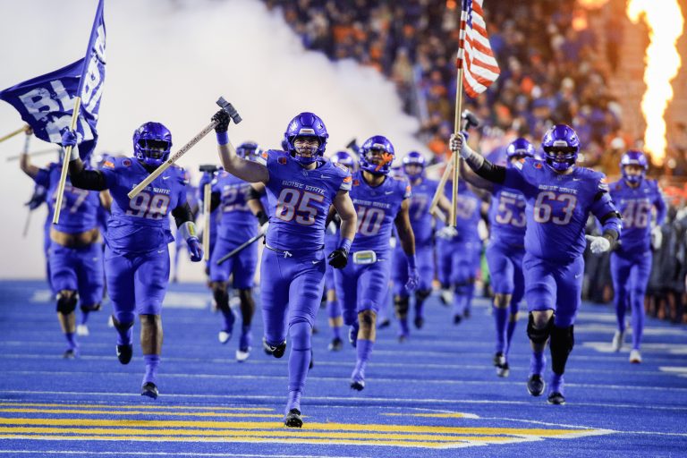 Boise State Broncos tight end Matt Lauter (85) leads the team onto the field before the game against the UNLV Rebels at Albertsons Stadium.