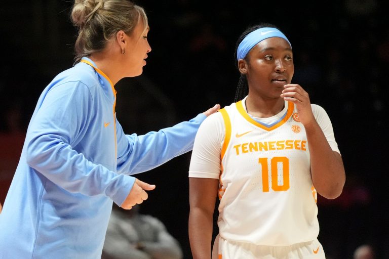 Tennessee basketball coach Kim Caldwell talks to Destinee Wells (10) during the NCAA college basketball game against North Carolina Central on Saturday, December 14, 2024, in Knoxville, Tenn.