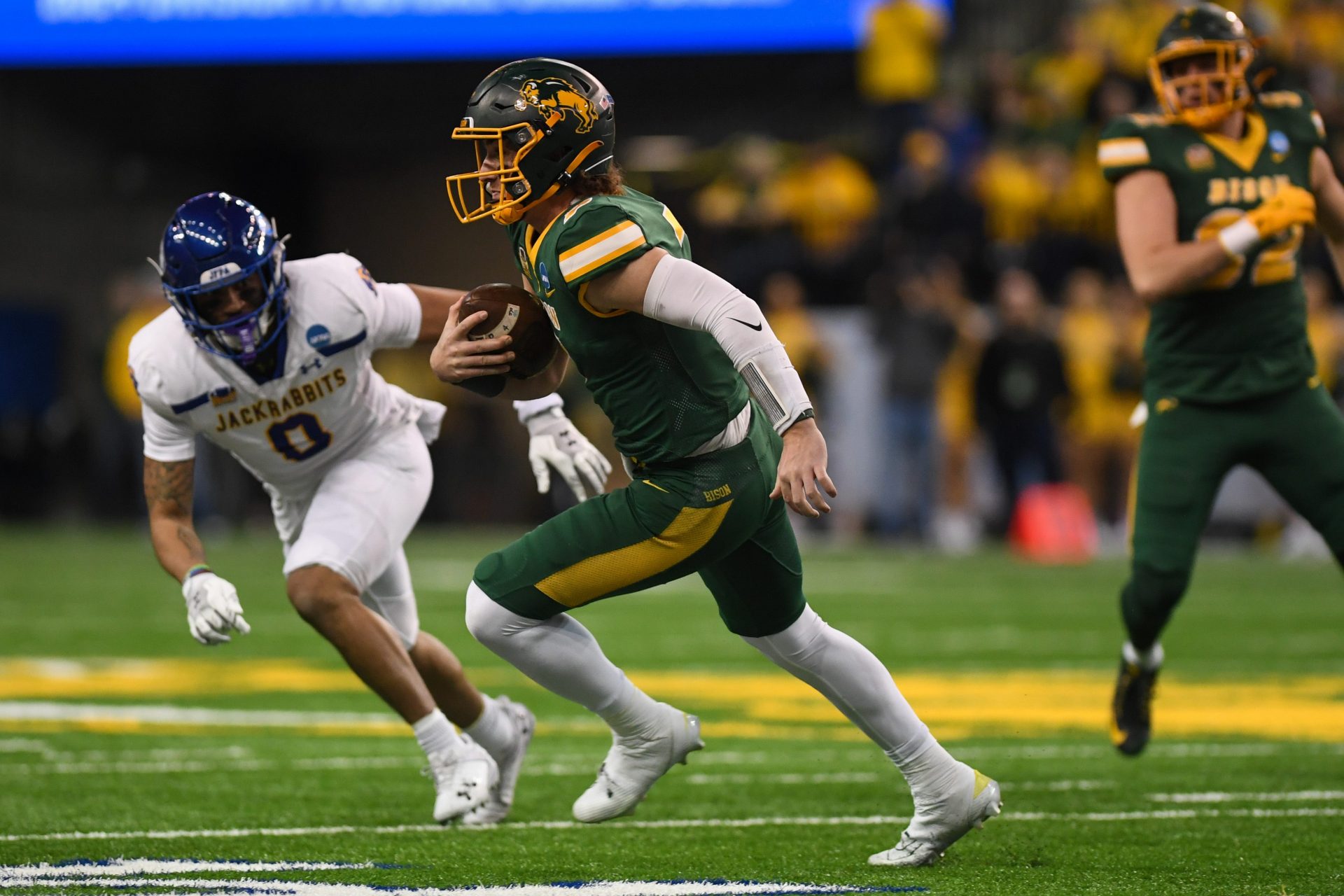 Cam Miller (7) rushes the ball on Saturday, Dec. 21, 2024