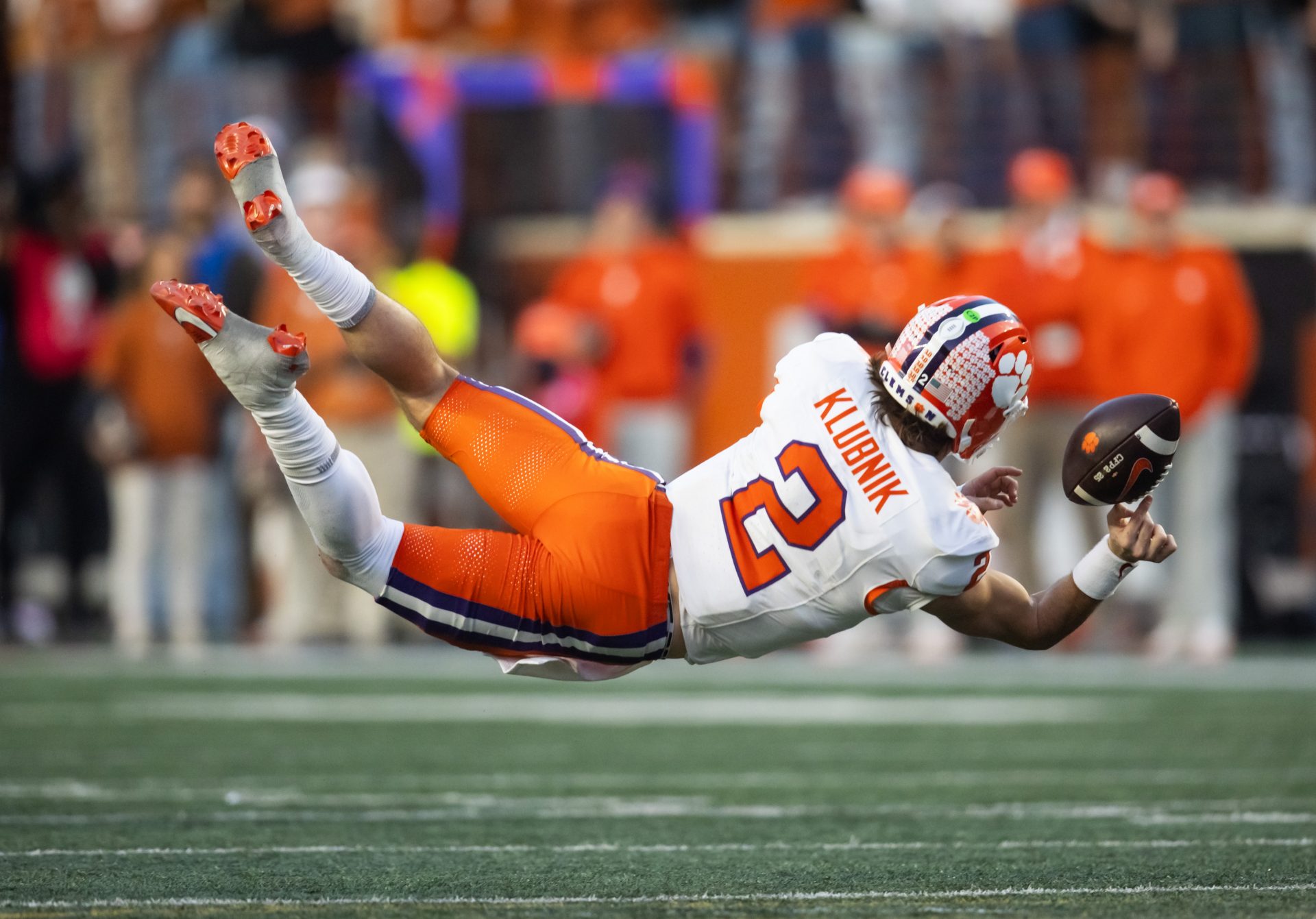 Clemson Tigers quarterback Cade Klubnik (2) throws a pass he he falls to the ground against the Texas Longhorns during the second half of the CFP National playoff first round at Darrell K Royal-Texas Memorial Stadium.