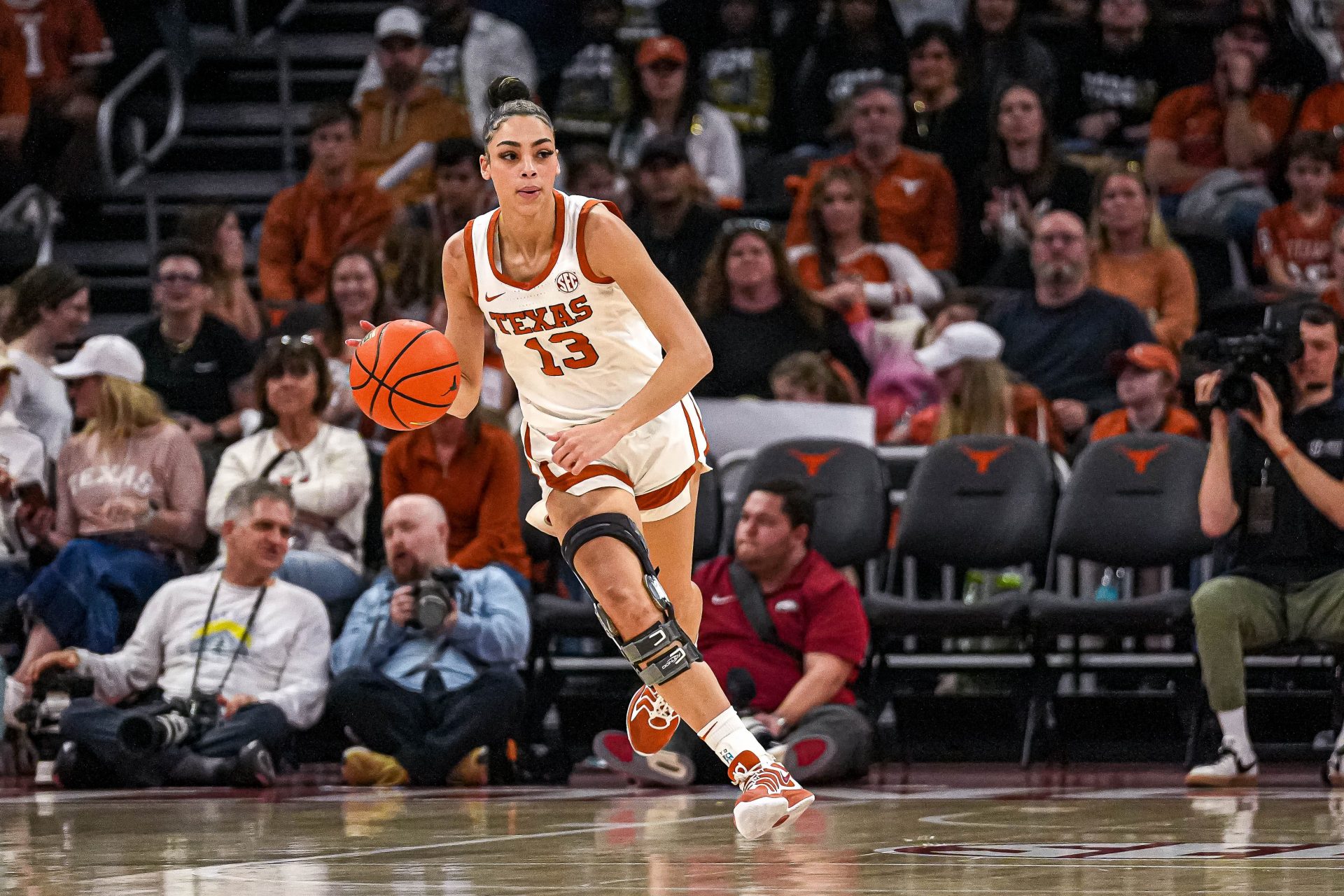 Texas Longhorns guard Jordana Codio (13) dribbles the ball towards the Arkansas basket during the game at the Moody Center on Sunday, Jan. 5, 2025.