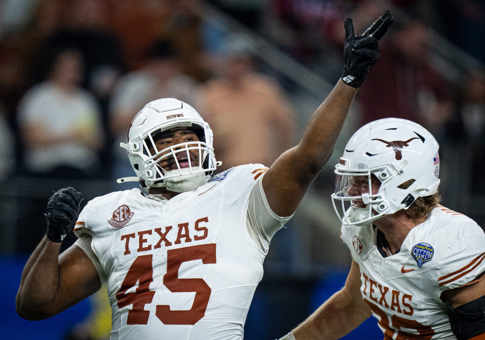 Texas Longhorns defensive lineman Vernon Broughton (45) celebrates a quarterback sack in the third quarter as the Texas Longhorns play the Ohio State Buckeyes in the Cotton Bowl College Football Playoff semi-final at AT&T Stadium in Dallas, Texas, Jan. 10, 2025.