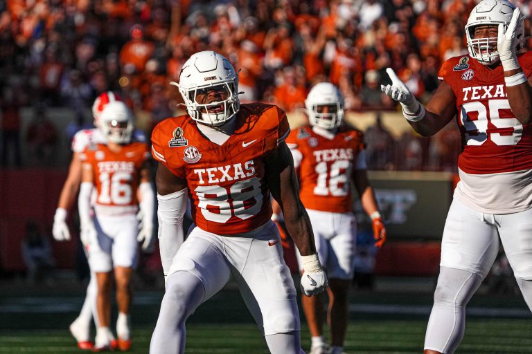 Texas Longhorns edge rusher Barryn Sorrell (88) celebrates a sack on Clemson quarterback Cade Klubnik (2) during the first round of the College Football Playoffs