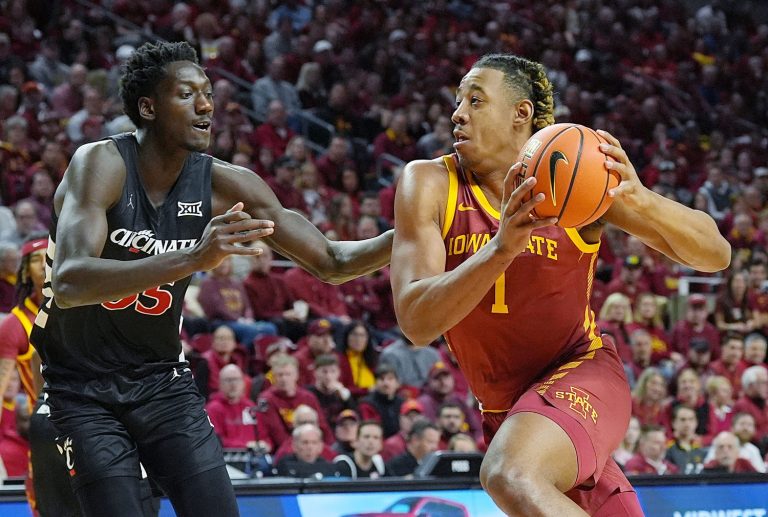 Iowa State Cyclones center Dishon Jackson (1) drives with the ball to the basket around Cincinnati Bearcats' forward Aziz Bandaogo (55) during the first half in the Big-12 men’s basketball at Hilton Coliseum on Feb. 15, 2025 in Ames, Iowa.