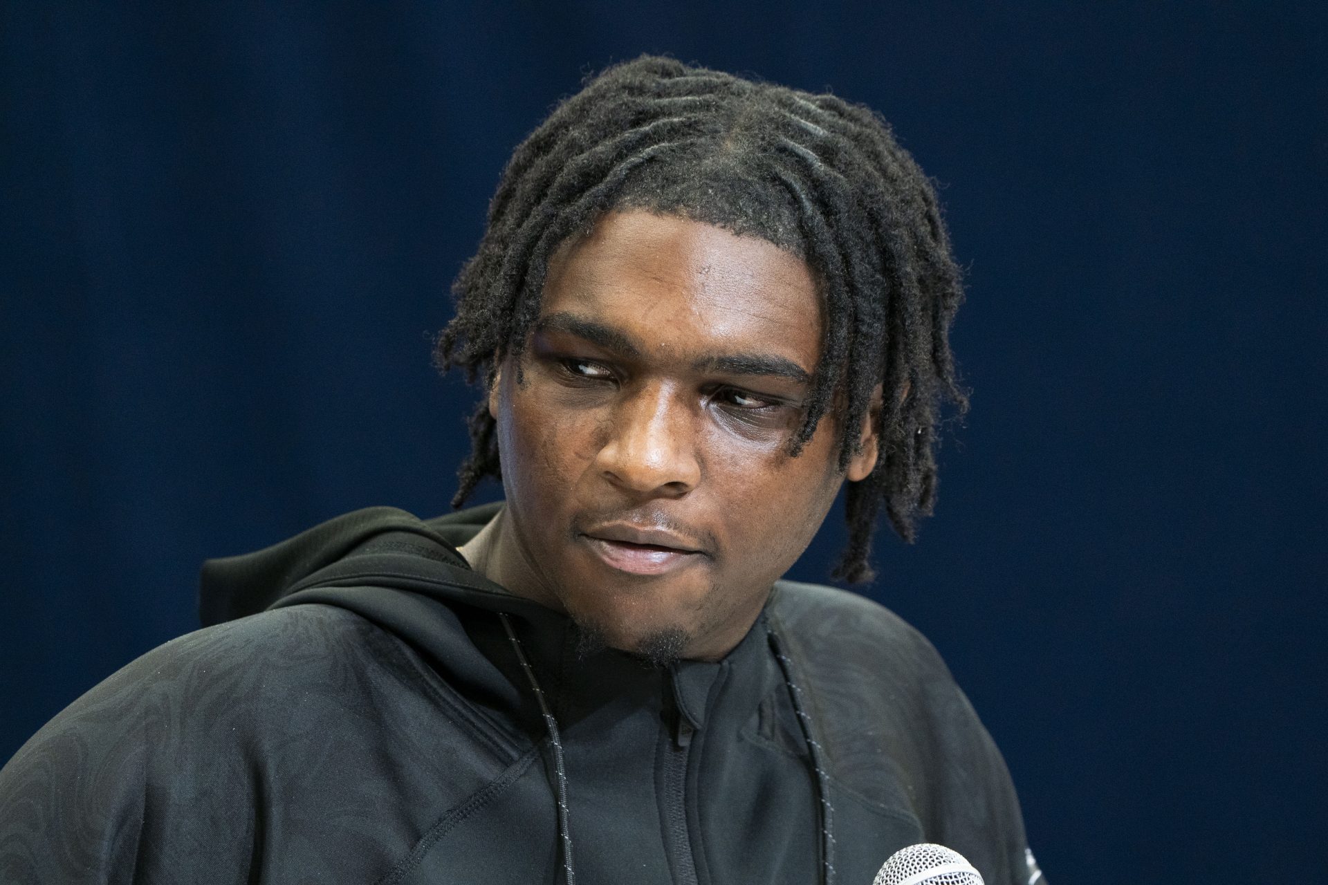 Miami quarterback Cam Ward (QB15) talks to the press during the 2025 NFL Combine at Indiana Convention Center.