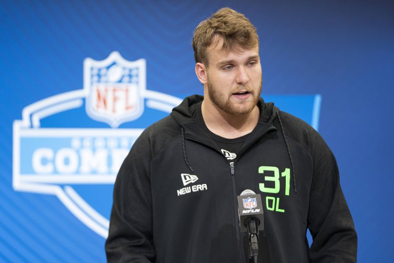 University of Wisconsin offensive lineman Jack Nelson (OL31) answers questions at a press conference during the 2025 NFL Combine at Indiana Convention Center.