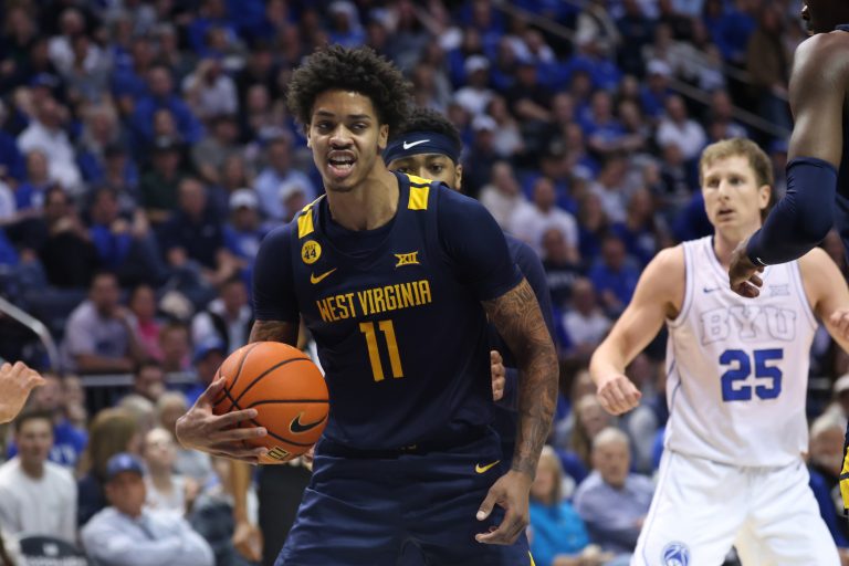 West Virginia Mountaineers guard Jonathan Powell reacts after a rebound against the Brigham Young Cougars during the first half at Marriott Center.