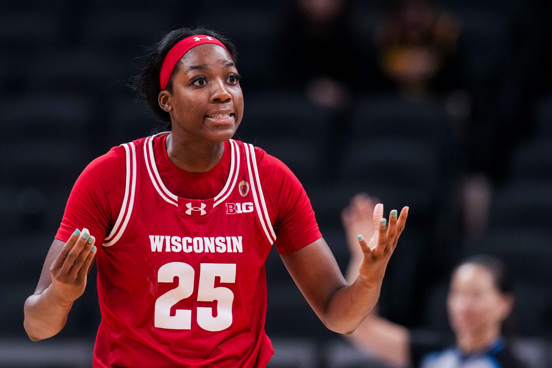 Wisconsin Badgers forward Serah Williams (25) reacts to a call Wednesday, March 5, 2025, in a round one game at the 2025 TIAA Big Ten Women's Basketball Tournament between the Iowa Hawkeyes and the Wisconsin Badgers at Gainbridge Fieldhouse in Indianapolis.