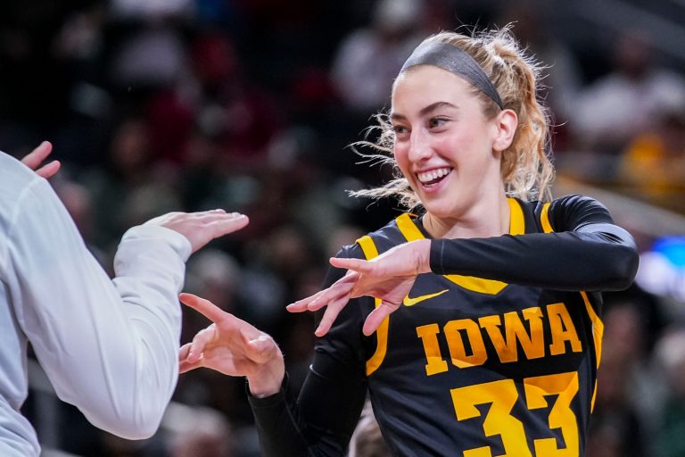 Iowa Hawkeyes guard Lucy Olsen (33) gets introduced Thursday, March 6, 2025, in a round two game at the 2025 TIAA Big Ten Women's Basketball Tournament between the Iowa Hawkeyes and the Michigan State Spartans at Gainbridge Fieldhouse in Indianapolis.