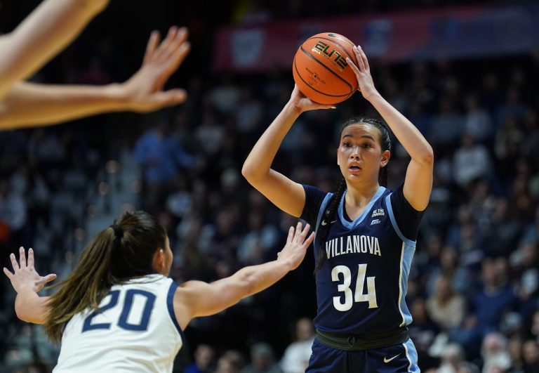 Villanova Wildcats guard Maddie Webber (34) looks to pass the ball against UConn Huskies guard Kaitlyn Chen (20) in the second half at Mohegan Sun Arena.