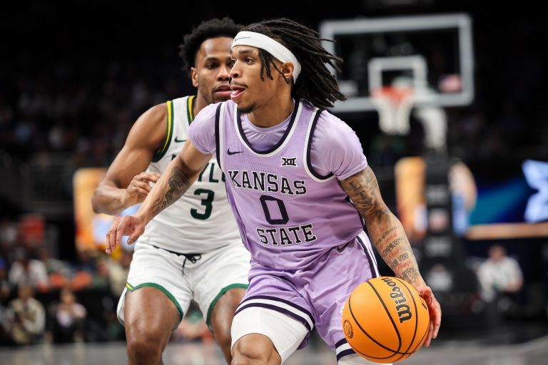 Kansas State Wildcats guard Dug McDaniel (0) drives to the basket during the second half against the Baylor Bears at T-Mobile Center.