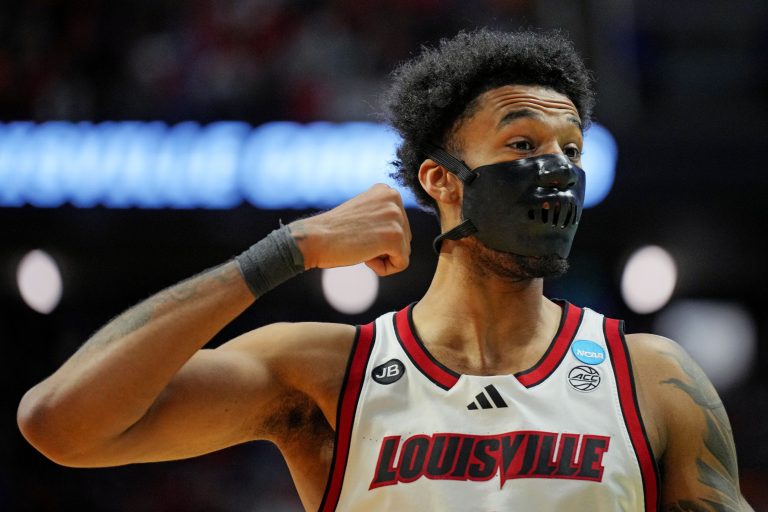Louisville Cardinals forward James Scott (0) reacts during the first half against the Creighton Bluejays in the first round of the NCAA Tournament at Rupp Arena.