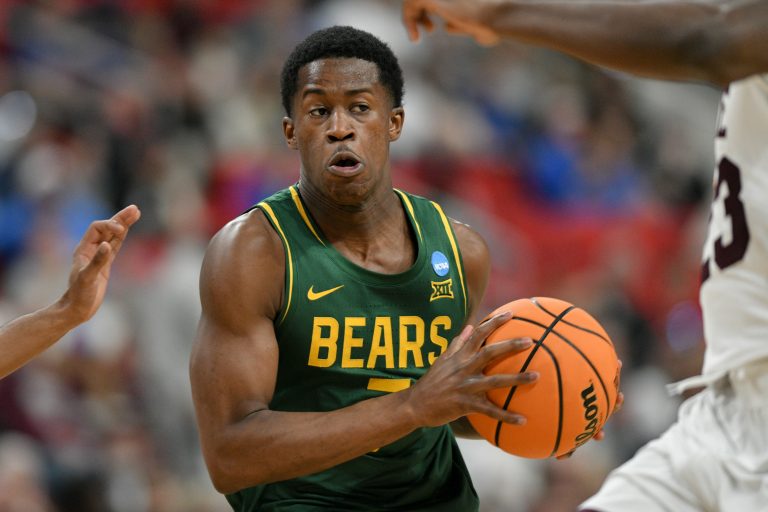 Baylor Bears guard VJ Edgecombe (7) has the ball against the Mississippi State Bulldogs during the second half in the first round of the NCAA Tournament at Lenovo Center.