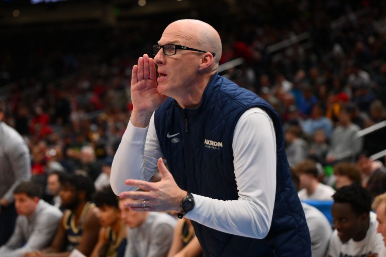 Akron Zips head coach John Groce reacts during the first half in the first round of the NCAA Tournament at Climate Pledge Arena.