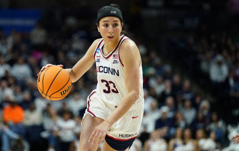 UConn Huskies guard Caroline Ducharme (33) drives the ball against the Arkansas State Red Wolves in the first half at Harry A. Gampel Pavilion.