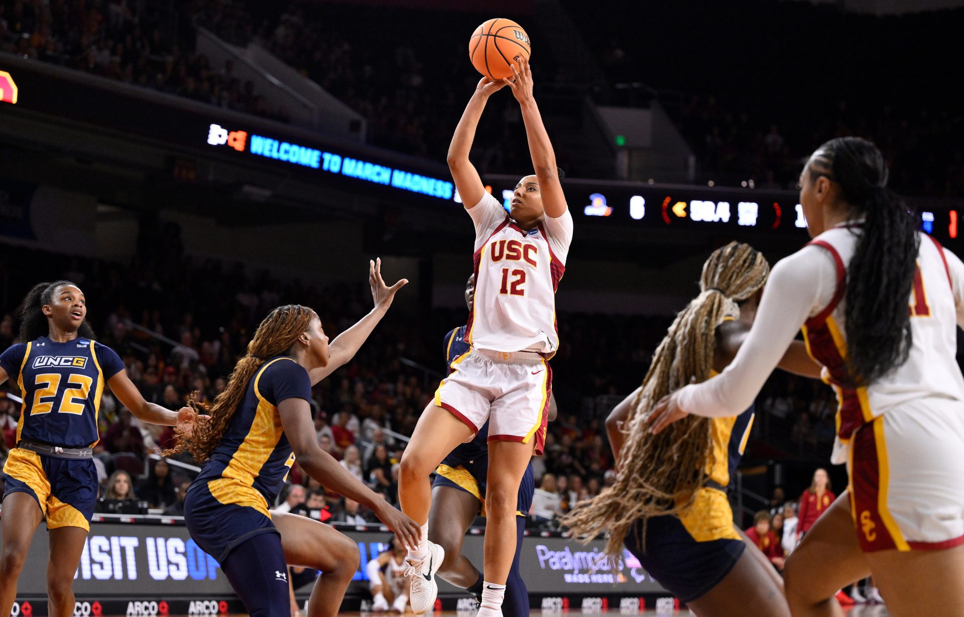 USC Trojans guard JuJu Watkins (12) shoots over UNC Greensboro Spartans guard Jaila Lee (4) during the second quarter of an NCAA Tournament game at Galen Center.