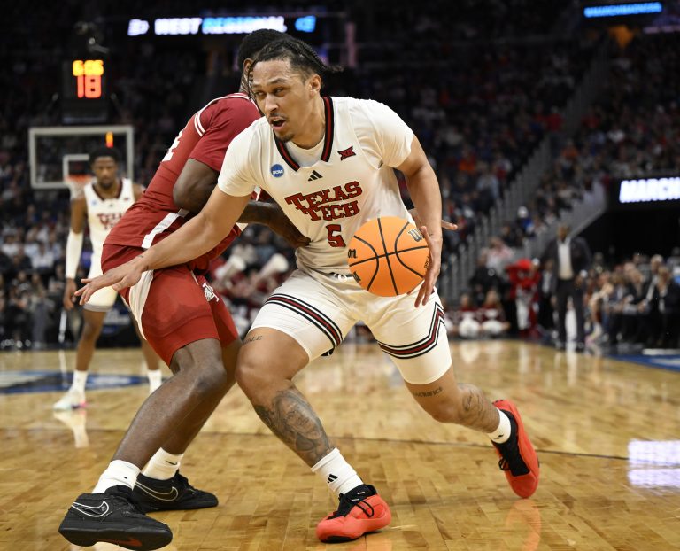 Texas Tech Red Raiders forward Darrion Williams (5) drives to the hoop past Arkansas Razorbacks forward Billy Richmond III (24) during the second half during a West Regional semifinal of the 2025 NCAA tournament at Chase Center.