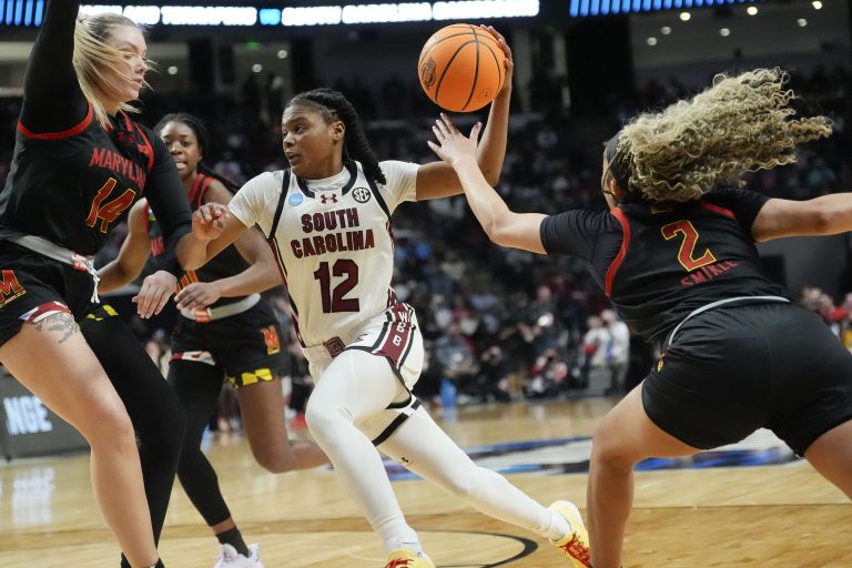 Maryland Terrapins forward Allie Kubek (14) and guard Kaylene Smikle (2) defend South Carolina Gamecocks guard MiLaysia Fulwiley (12) at Legacy Arena.