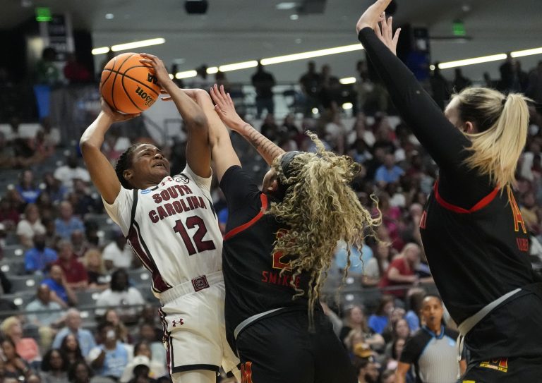 Maryland Terrapins guard Kaylene Smikle (2) fouls South Carolina Gamecocks guard MiLaysia Fulwiley (12) at Legacy Arena.