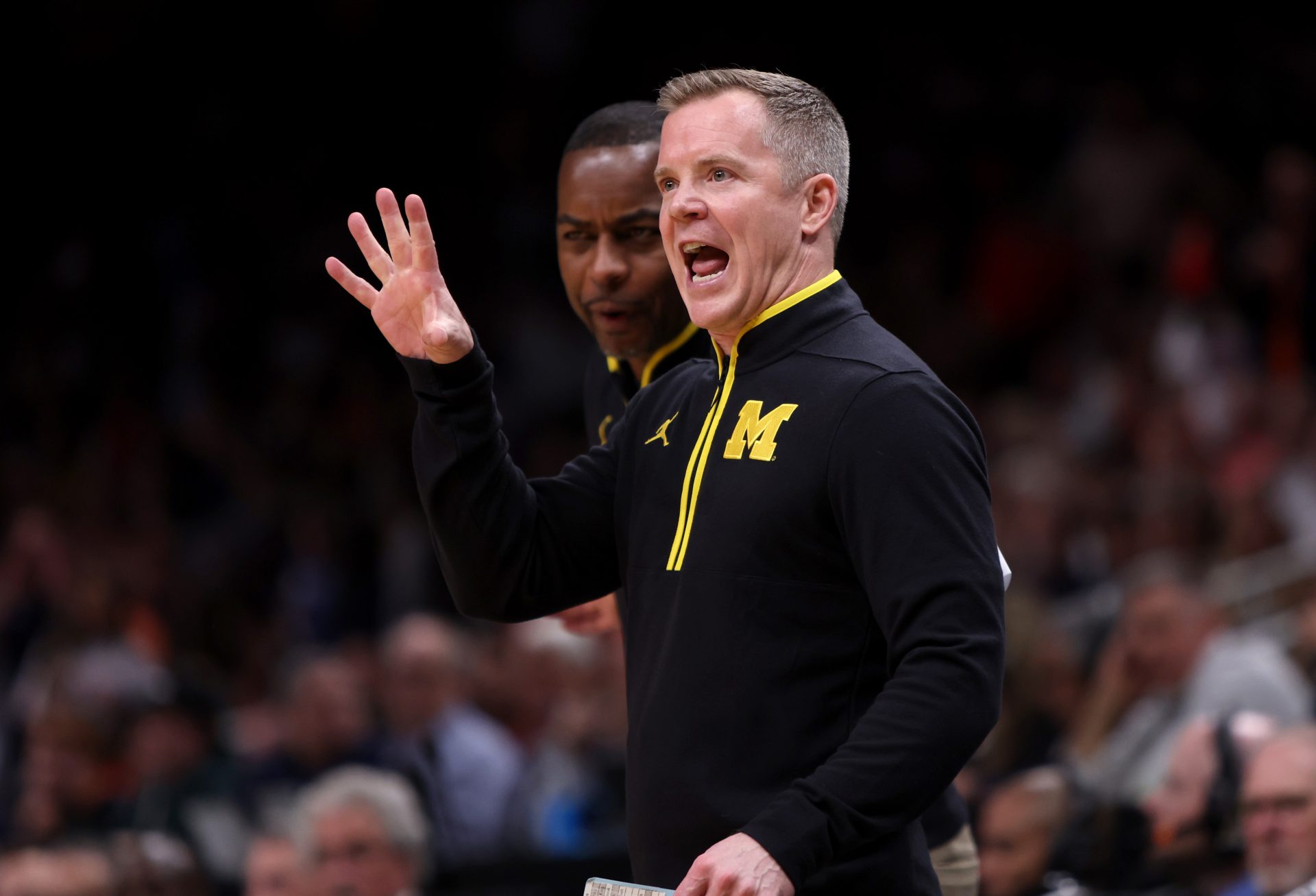 Michigan Wolverines head coach Dusty May in the first half of a South Regional semifinal of the 2025 NCAA tournament against the Auburn Tigers at State Farm Arena.