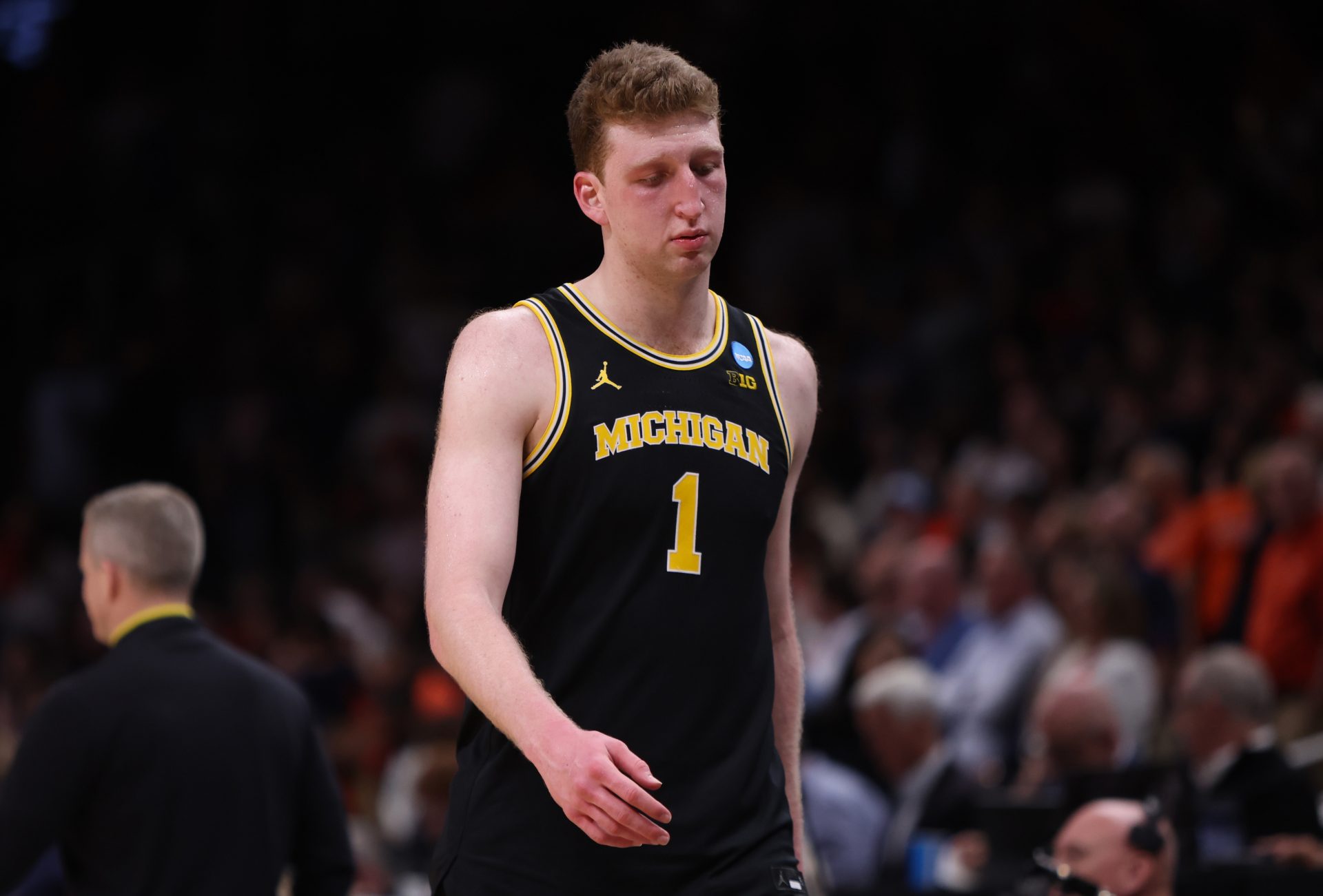 Michigan Wolverines center Danny Wolf (1) reacts after losing to the Auburn Tigers in a South Regional semifinal of the 2025 NCAA tournament at State Farm Arena.