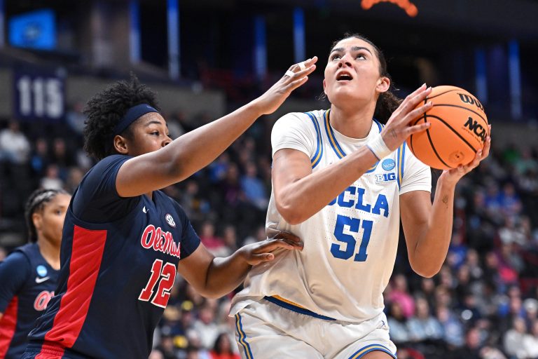 UCLA Bruins center Lauren Betts (51) shoots against Ole Miss Rebels forward Christeen Iwuala (12) during the second half of a Sweet 16 NCAA Tournament basketball game at Spokane Arena. at Spokane Arena.