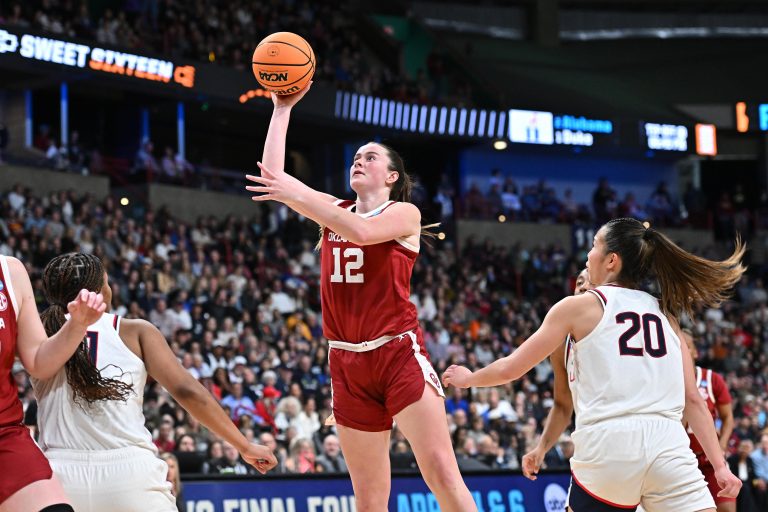 Oklahoma Sooners guard Payton Verhulst (12) shoots against UConn Huskies guard Kaitlyn Chen (20) during the second half of a Sweet 16 NCAA Tournament basketball game at Spokane Arena.