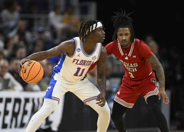 Florida Gators guard Denzel Aberdeen (11) drives to the hoop past Texas Tech Red Raiders guard Elijah Hawkins (3) during the second half during the West Regional final of the 2025 NCAA tournament at Chase Center.