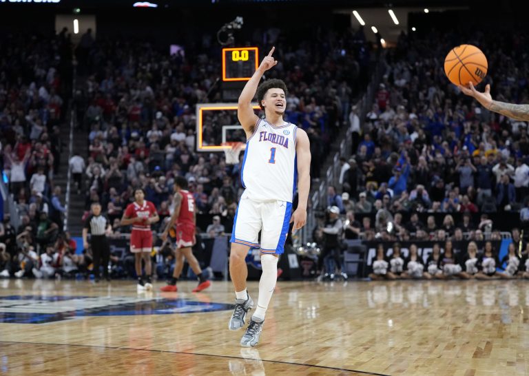 Florida Gators guard Walter Clayton Jr. (1) celebrates defeating the Texas Tech Red Raiders during the West Regional final of the 2025 NCAA tournament at Chase Center.