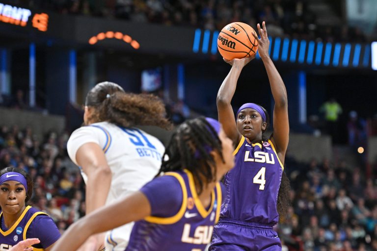 LSU Lady Tigers guard Flau'Jae Johnson (4) shoots against UCLA Bruins center Lauren Betts (51) during the second half of a Elite 8 NCAA Tournament basketball game at Spokane Arena.