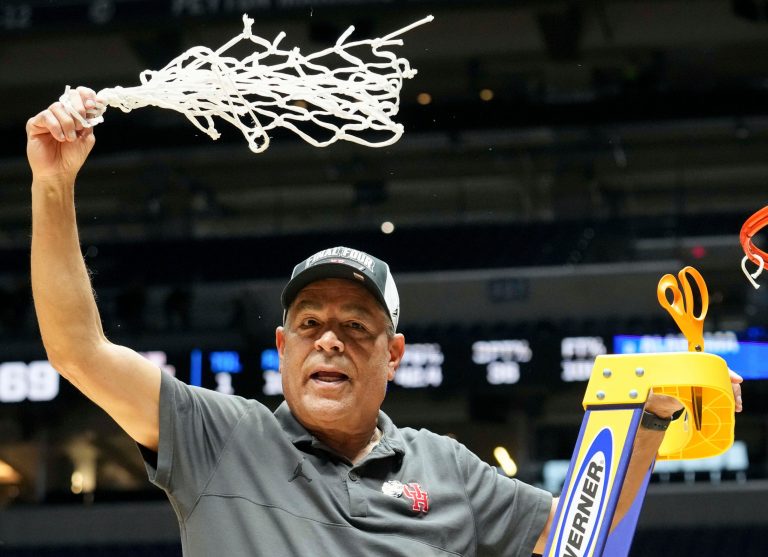 Houston Cougars head coach Kelvin Sampson celebrates after his team defeats the Tennessee Volunteers in a game Sunday, March 30, 2025, during the Elite Eight round of the NCAA March Madness tournament at Lucas Oil Stadium in Indianapolis. Houston defeated Tennessee 69-50.