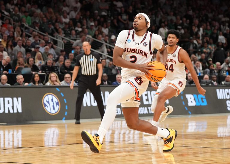 Auburn Tigers guard Denver Jones (2) drives during the second half in the South Regional final of the 2025 NCAA tournament against the Michigan State Spartans at State Farm Arena.