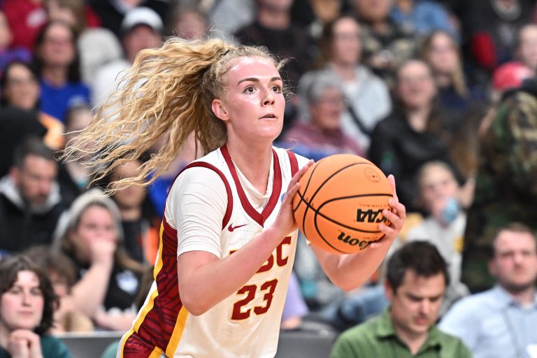 USC Trojans guard Avery Howell (23) shoots against the UConn Huskies during the first half of a Elite 8 NCAA Tournament basketball game at Spokane Arena.