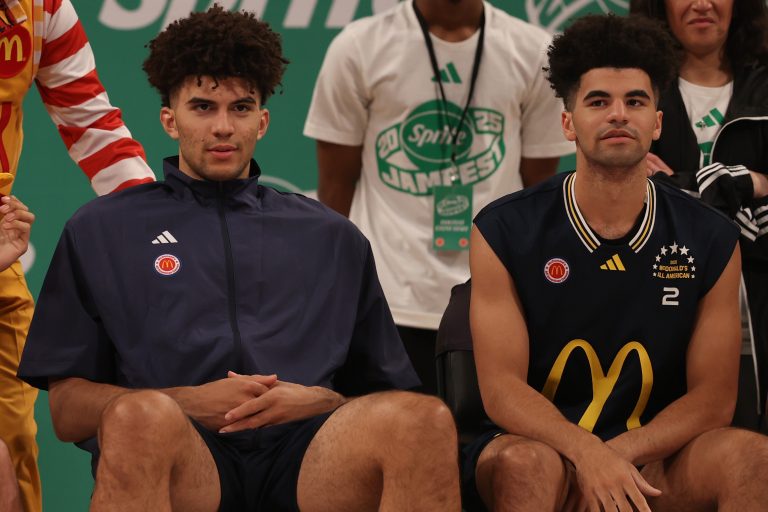 Americans East forward Cameron Boozer (12), left, and East guard Cayden Boozer (2), right, sit on the court during the Sprite Jam Fest at Barclay's Center.