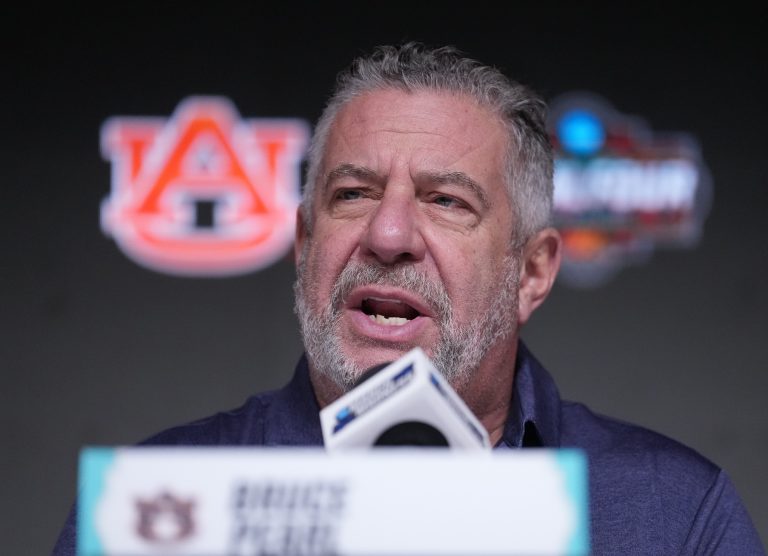 Auburn head coach Bruce Pearl talks to the media at the Alamodome.