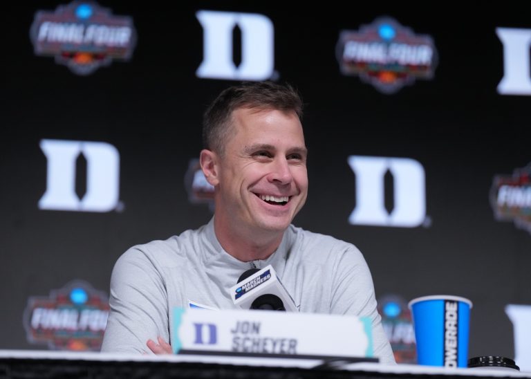 Duke head coach Jon Scheyer talks to the media at the Alamodome.