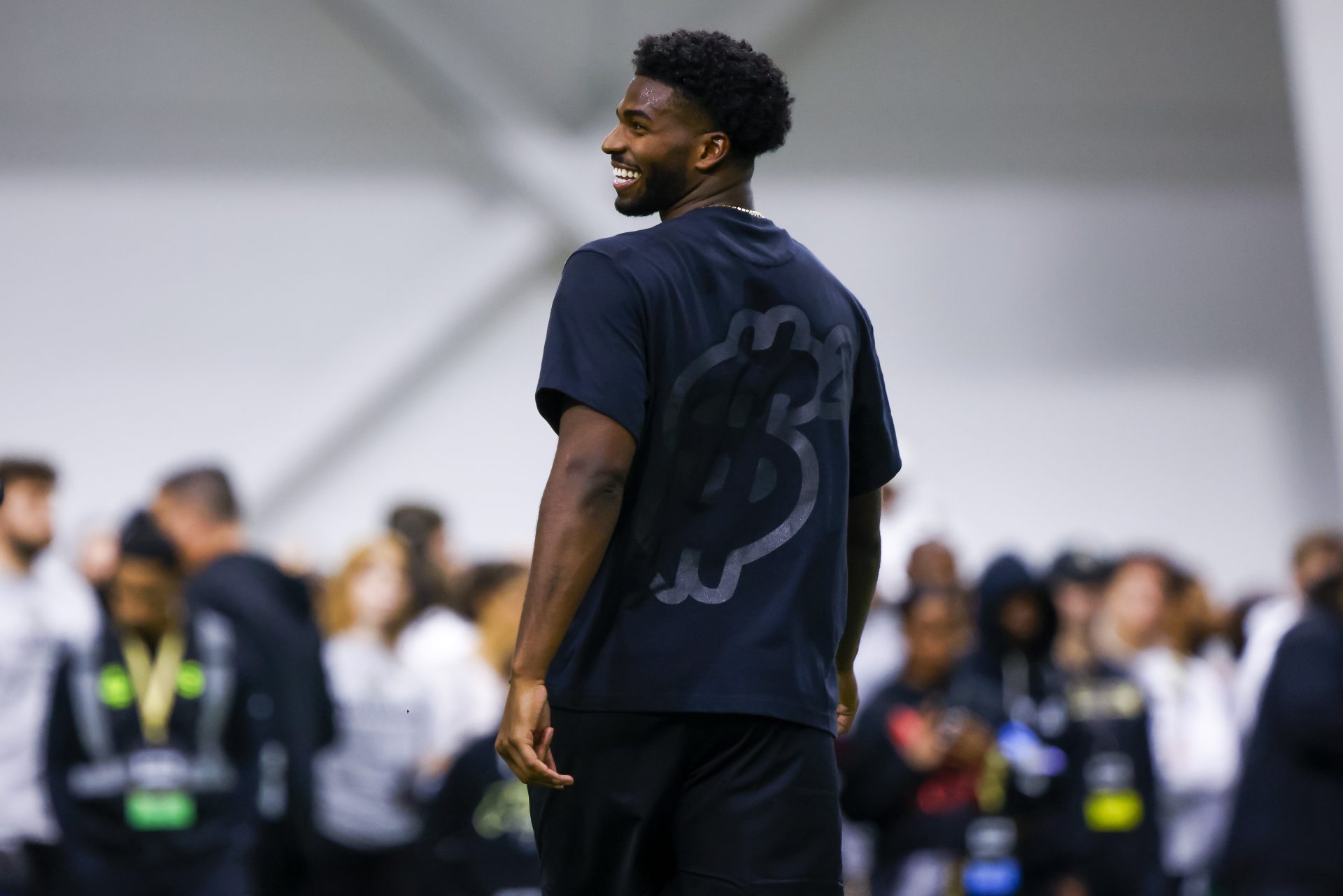 Colorado Buffaloes quarterback Shedeur Sanders (2) laughs during the University of Colorado NFL Showcase at the CU Indoor Practice Facility.