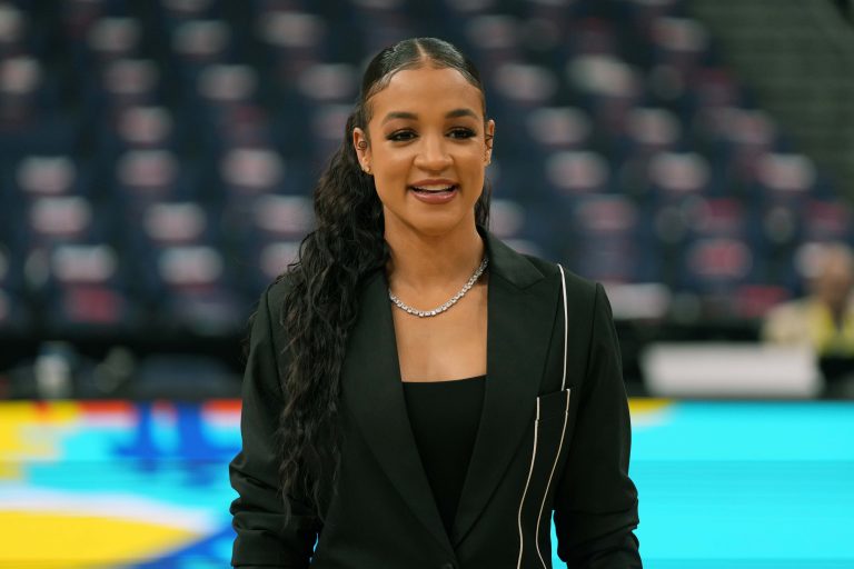 ESPN analyst Andraya Carter poses prior to a semifinal of the women's 2025 NCAA tournament at Amalie Arena.