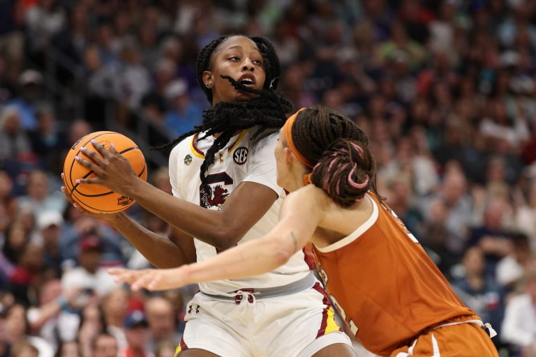 South Carolina Gamecocks forward Joyce Edwards (8) controls the ball against Texas Longhorns guard Ndjakalenga Mwenentanda (32) during the third quarter in a semifinal of the women's 2025 NCAA tournament at Amalie Arena.