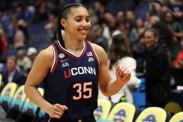 Connecticut Huskies guard Azzi Fudd (35) leaves the court after defeating the UCLA Bruins during the fourth quarter in a semifinal of the women's 2025 NCAA tournament at Amalie Arena.