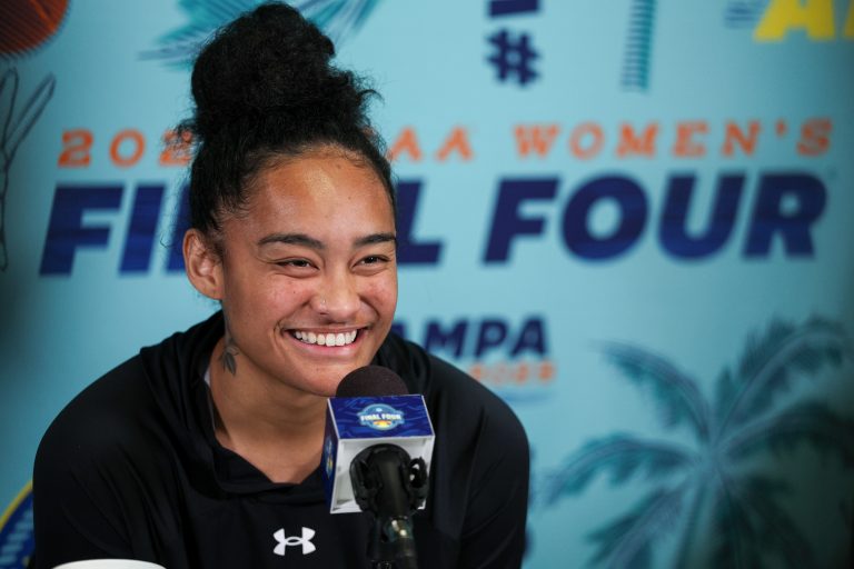 Te-Hina Paopao celebrated her WNBA Draft selection with regal Samoan attire, honoring heritage and marking a proud career milestone.