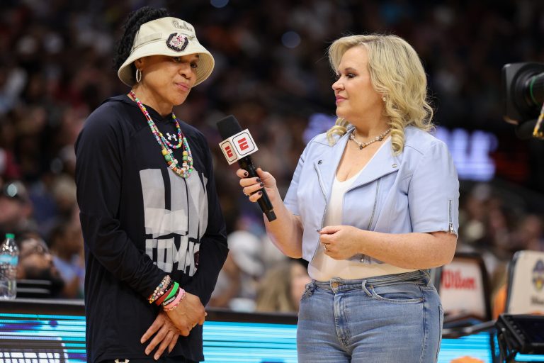 South Carolina Gamecocks head coach Dawn Staley talks to ESPN commentator Holly Rowe before practice at Amalie Arena.