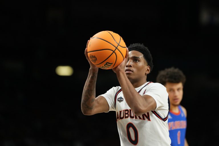 Auburn Tigers guard Tahaad Pettiford (0) shoots a free throw against the Florida Gators during the first half in the semifinals of the men's Final Four of the 2025 NCAA Tournament at the Alamodome.