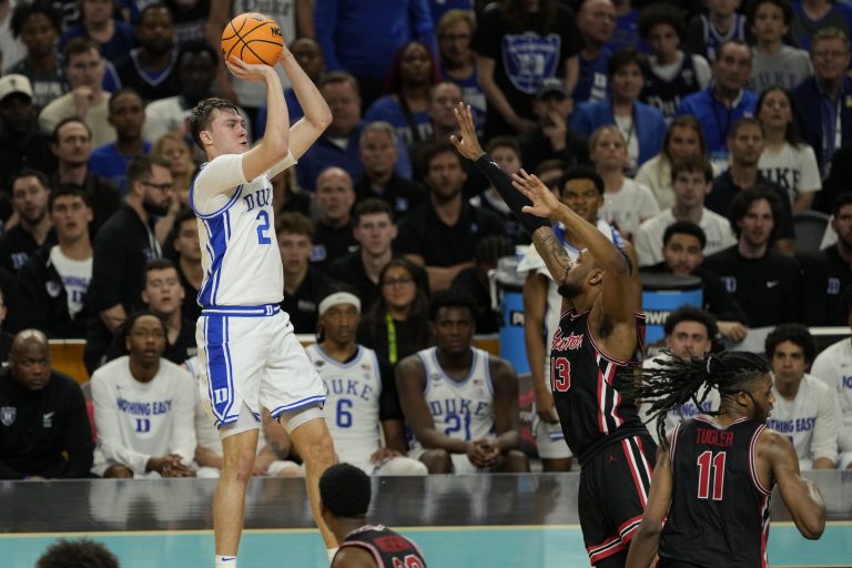 Duke Blue Devils forward Cooper Flagg (2) shoots the ball against Houston Cougars forward J'Wan Roberts (13) during the second half in the semifinals of the men's Final Four of the 2025 NCAA Tournament at Alamodome.
