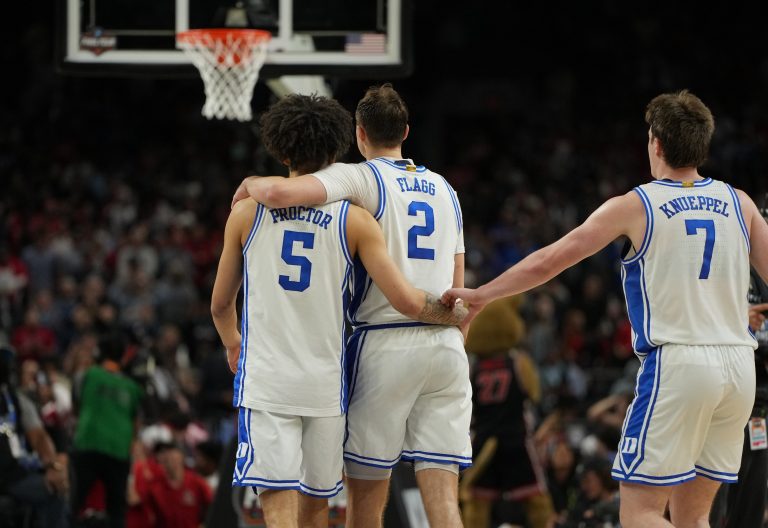 Duke Blue Devils guard Tyrese Proctor (5), forward Cooper Flagg (2), and guard Kon Knueppel (7) console each other late in the second half in the semifinals of the men's Final Four of the 2025 NCAA Tournament