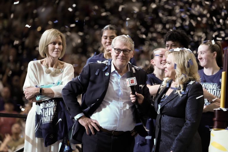 Connecticut Huskies head coach Geno Auriemma is interviewed by ESPN reporter Holly Rowe of the national championship of the women's 2025 NCAA tournament at Amalie Arena.