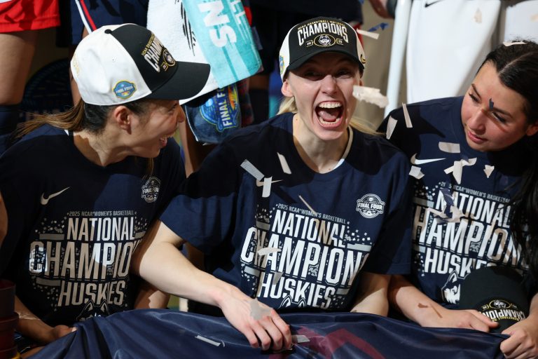Connecticut Huskies guard Kaitlyn Chen (20) and guard Paige Bueckers (5) celebrates after winning the national championship of the women's 2025 NCAA tournament against the South Carolina Gamecocks at Amalie Arena.